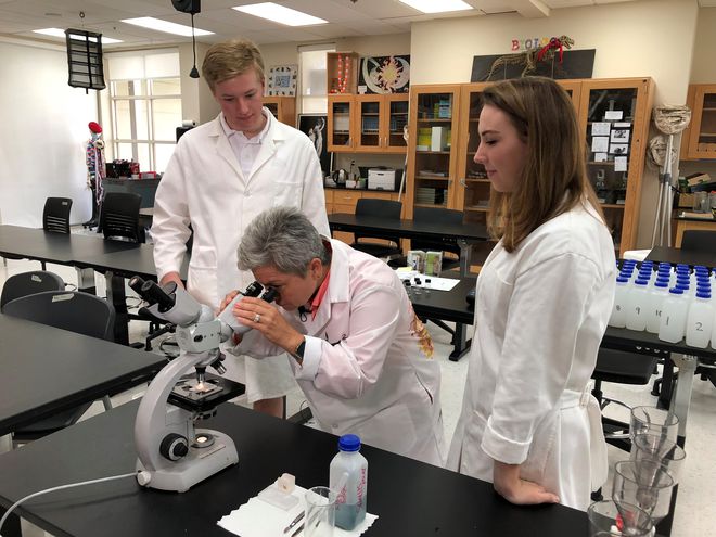 dr-theresa-thornton-the-coordinator-of-scientific-research-tests-the-students-knowledge-on-the-sample-taken-from-water-near-the-sewell-bridge-1539983842