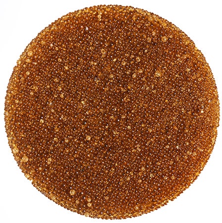 Resin beads used in ion-exchange drinking water treatment systems.